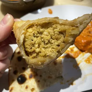 Inside of the vegetable Samosa, though it may look a little dry it is absolutely delicious!