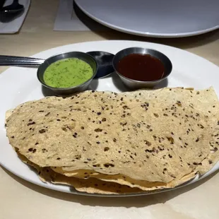 Papadams served with the mint and tamarind chutneys