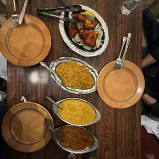 Chicken Tandoori a La Carte, biryanis rice, paneer korma, Beef Vindaloo a La Carte