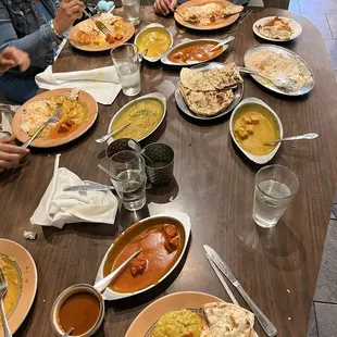 Amazing food! Shrimp Coconut Curry, Butter Chicken (chicken Makhani), Paneer Tikka Masala, lentils, Lamb, and Butter Garlic Basil Naan!
