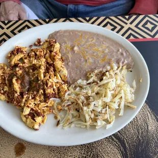 Chorizo and eggs with red Chile, potatoes and beans