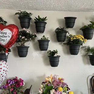 Flowers on the wall above a real old-fashioned radio playing country and western music