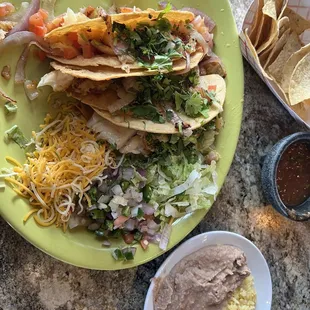 Fish tacos in crispy corn taco shells.