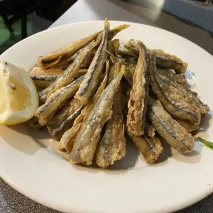 Fried Smelts  Super delish with lemon, then dipped in tarter sauce and cocktail sauce