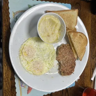 Two eggs + homemade sausage + grits + toast