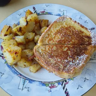 $8.75 French toast sandwich w/sausage egg and cheese and home fries