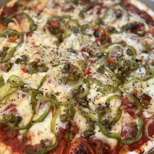 Large pizza with sausage, pepperoni, giardinera, onion &amp; green pepper