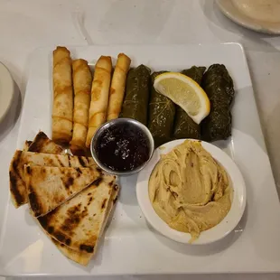 Sampler platter (hummus, grape leaves, filo dough, rose jam, pita)