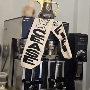 Two representations of their cultures. Alpacas and coffee.