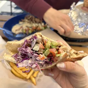 Shwarma sandwich with chicken -- 75% eaten thru haha