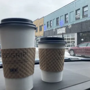 Large oatmilk latte and small