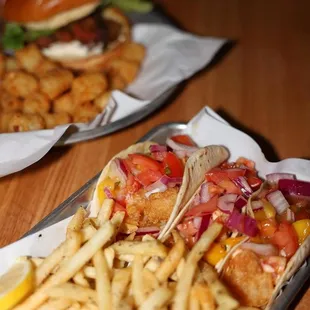 two trays of food on a table
