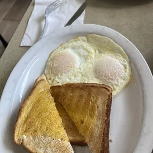 Over medium eggs, white toast and ham (separate plate) super cheap breakfast combos!