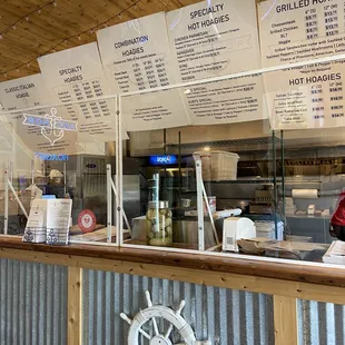 menus on the wall of a restaurant