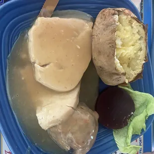 Hot Turkey Dinner with Baked Potato, stuffing and cranberry sauce