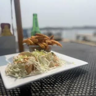 Beer, Shrimp tacos, and a serene view.