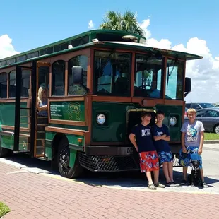 My 3 kids in front of the trolley