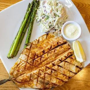 Grilled Rainbow Trout ($22) comes w/ two sides: asparagus &amp; coleslaw pictured