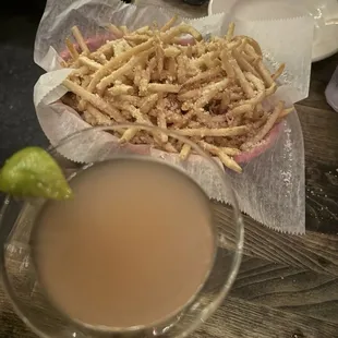 Grapefruit martini and truffle fries