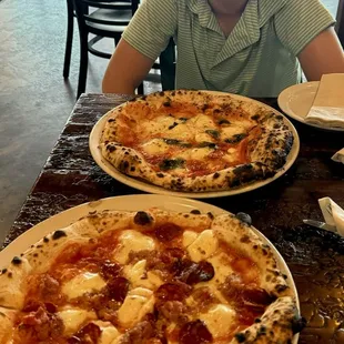 Two great pies and a great kid.