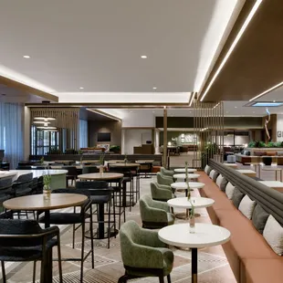  a restaurant with tables and chairs