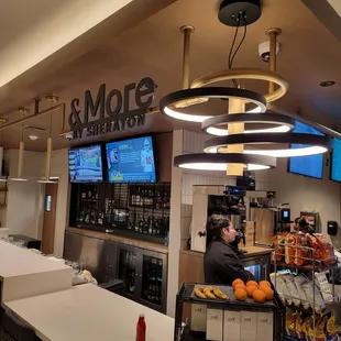  a man sitting at a counter in a restaurant