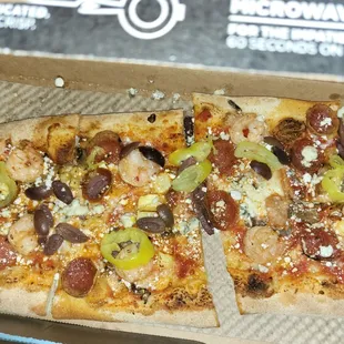 Pepperoni, sausage, banana peppers, mushrooms,  olives, shredded cheese &amp;mozzarella, goat cheese &amp;shrimp not ordered