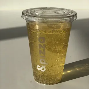 a cold drink in a plastic cup