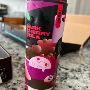  a can of dark cherry cola