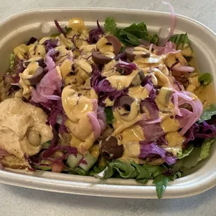 Chicken Rice Bowl.  This one has no rice - it's all lettuce base.  The sauce is Garlic.  Ball of spicy hummus in the left front corner.