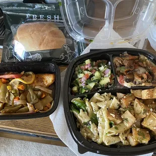 Pita bread, red snapper w/veggies on top, pasta salad, coriander potatoes, mushroom humus &amp; fattoush.