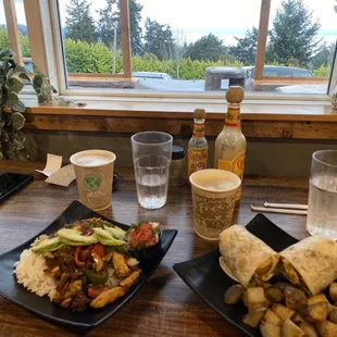 Chorizo and chicken fajitas on the left, veggie breakfast burrito on the right. Very tasty and an excellent view!