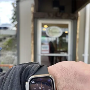 a close up of a person&apos;s wrist with a watch on it