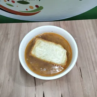 organic onion soup. Vegetable broth. Topped w/ a cheesy toast!