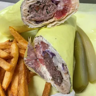 a sandwich and fries on a plate