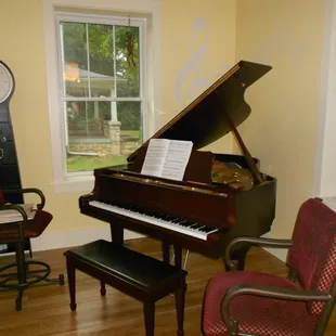 Music room for guest use with original 1910 pocket door