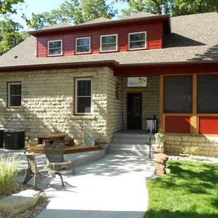Rear entrance with private parking lot off the alley