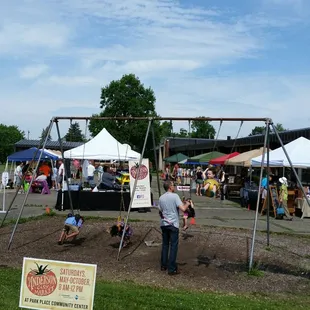 a man and a child on a swing set