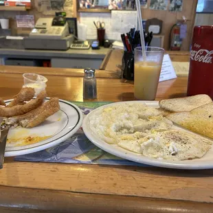 Fish &amp; grits with 2 eggs and toast