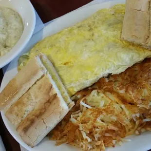 Ham &amp; Cheese Omelette $6.50, plus $1 for Hash Browns, 50¢ extra for Cuban Toast, and bowl of Grits $2.50