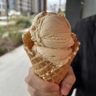 Salted caramel and pumpkin chai in a waffle cone