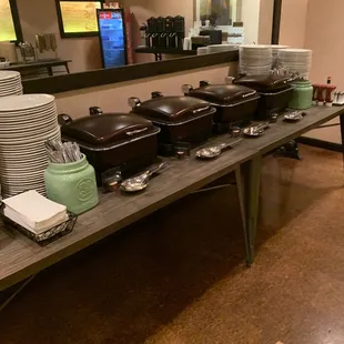 a table with a variety of dishes on it