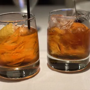 Tito's, aperol, vermouth cocktail (forgot the name) and a "godfather old fashion" (right)