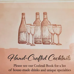 a picture of a menu for hand crafted cocktails