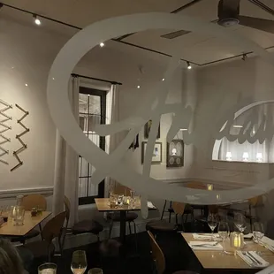 a restaurant with a circular window