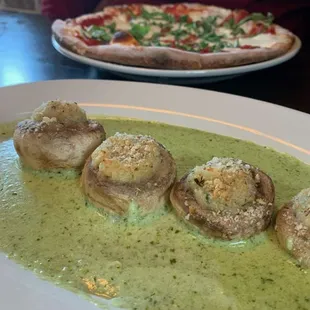 Stuffed seafood mushrooms in pesto sauce, Margherita pizza