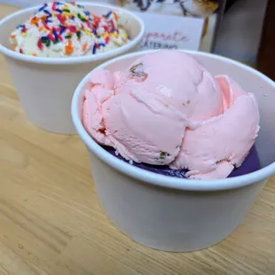 Double Scoop. $8.00. Rose Pistachio on top and Ube on the bottom. Background is French Vanilla on top and Cake Batter on the bottom.