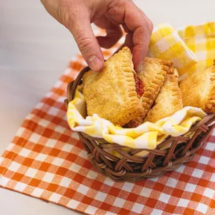 a basket of pastries on a table