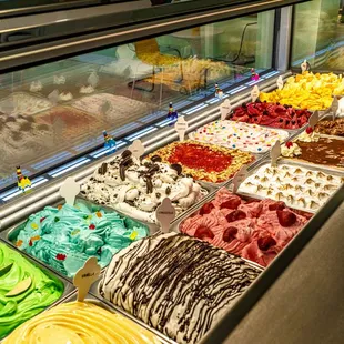 a display of different flavors of gelato