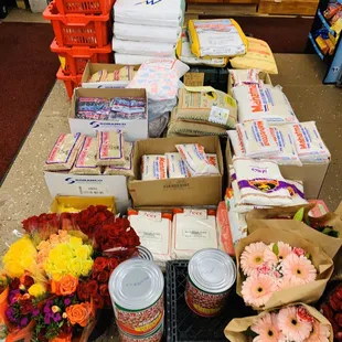 a variety of flowers and packaged goods